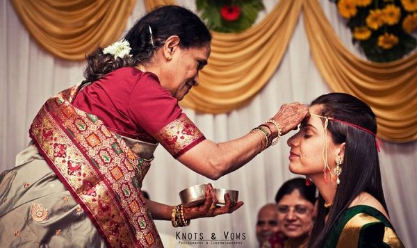 Hindu wedding ritual - mother and daughter