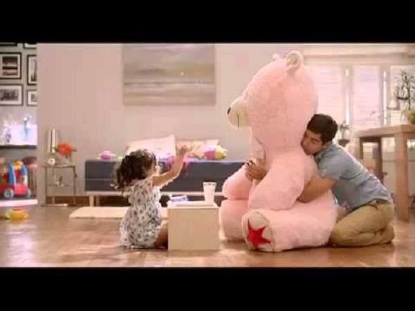 Father daughter, and bear in Oreo commercial